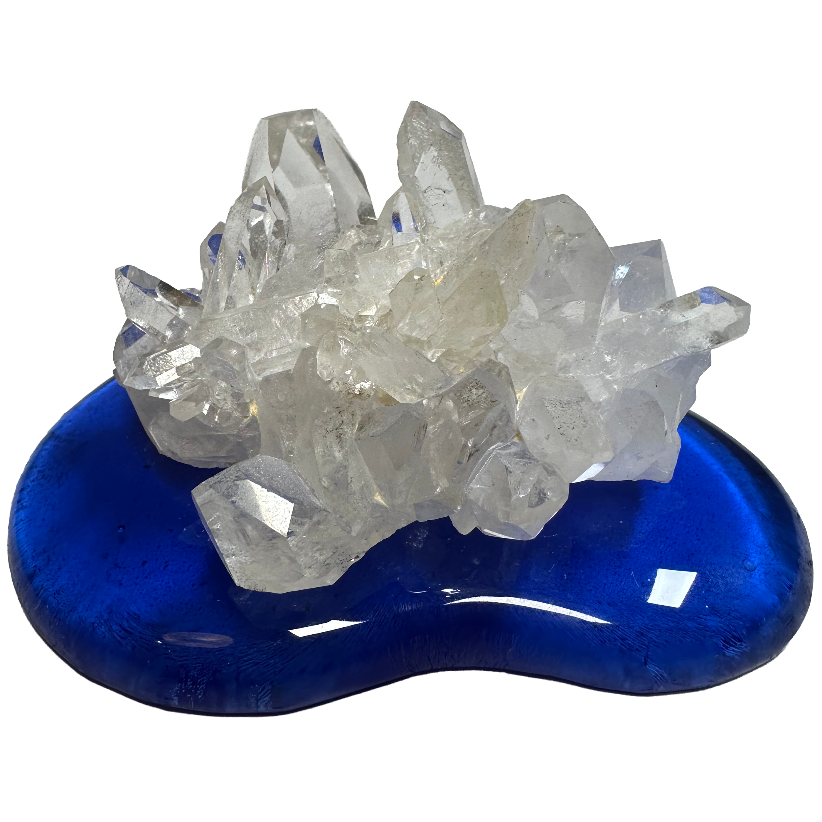 Cristal de quartz sur socle en verre bleu